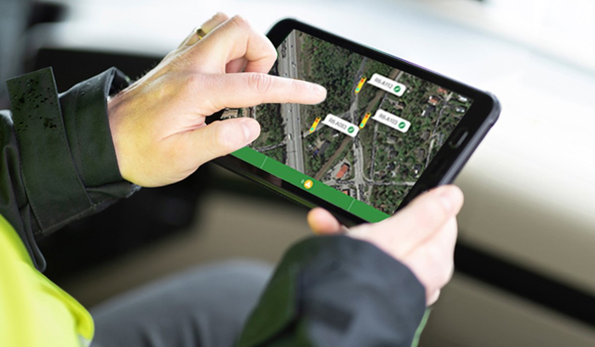Person using BerlexConnect from a vehicle